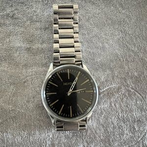 Men’s Nixon watch.